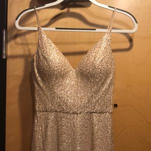 Full length formal gold sequined dress